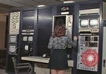 Image of Woman operates computer controls New Mexico United States USA, 1975, second 31 stock footage video 65675043084