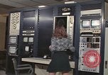 Image of Woman operates computer controls New Mexico United States USA, 1975, second 34 stock footage video 65675043084
