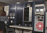 Image of Woman operates computer controls New Mexico United States USA, 1975, second 36 stock footage video 65675043084