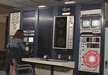 Image of Woman operates computer controls New Mexico United States USA, 1975, second 41 stock footage video 65675043084