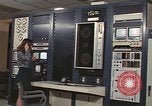 Image of Woman operates computer controls New Mexico United States USA, 1975, second 42 stock footage video 65675043084