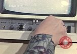 Image of Woman operates computer controls New Mexico United States USA, 1975, second 52 stock footage video 65675043084