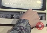 Image of Woman operates computer controls New Mexico United States USA, 1975, second 58 stock footage video 65675043084