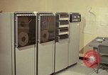 Image of Woman operates computer controls New Mexico United States USA, 1975, second 1 stock footage video 65675043085