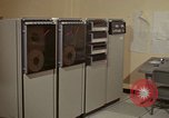 Image of Woman operates computer controls New Mexico United States USA, 1975, second 3 stock footage video 65675043085