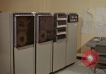 Image of Woman operates computer controls New Mexico United States USA, 1975, second 4 stock footage video 65675043085