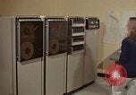 Image of Woman operates computer controls New Mexico United States USA, 1975, second 5 stock footage video 65675043085