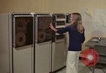 Image of Woman operates computer controls New Mexico United States USA, 1975, second 6 stock footage video 65675043085