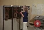 Image of Woman operates computer controls New Mexico United States USA, 1975, second 8 stock footage video 65675043085
