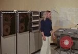 Image of Woman operates computer controls New Mexico United States USA, 1975, second 16 stock footage video 65675043085