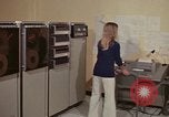 Image of Woman operates computer controls New Mexico United States USA, 1975, second 17 stock footage video 65675043085