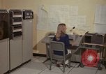 Image of Woman operates computer controls New Mexico United States USA, 1975, second 20 stock footage video 65675043085