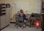Image of Woman operates computer controls New Mexico United States USA, 1975, second 22 stock footage video 65675043085