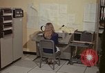 Image of Woman operates computer controls New Mexico United States USA, 1975, second 23 stock footage video 65675043085