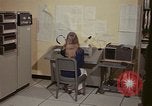 Image of Woman operates computer controls New Mexico United States USA, 1975, second 24 stock footage video 65675043085