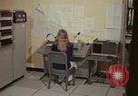 Image of Woman operates computer controls New Mexico United States USA, 1975, second 26 stock footage video 65675043085