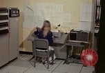 Image of Woman operates computer controls New Mexico United States USA, 1975, second 27 stock footage video 65675043085
