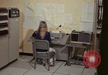 Image of Woman operates computer controls New Mexico United States USA, 1975, second 28 stock footage video 65675043085