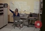 Image of Woman operates computer controls New Mexico United States USA, 1975, second 29 stock footage video 65675043085