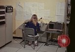 Image of Woman operates computer controls New Mexico United States USA, 1975, second 30 stock footage video 65675043085