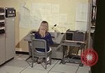 Image of Woman operates computer controls New Mexico United States USA, 1975, second 35 stock footage video 65675043085