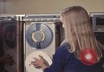 Image of Woman operates computer controls New Mexico United States USA, 1975, second 37 stock footage video 65675043085