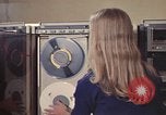 Image of Woman operates computer controls New Mexico United States USA, 1975, second 38 stock footage video 65675043085
