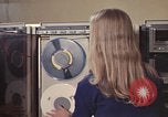 Image of Woman operates computer controls New Mexico United States USA, 1975, second 39 stock footage video 65675043085