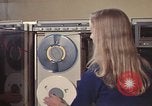Image of Woman operates computer controls New Mexico United States USA, 1975, second 40 stock footage video 65675043085