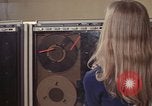 Image of Woman operates computer controls New Mexico United States USA, 1975, second 42 stock footage video 65675043085