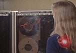 Image of Woman operates computer controls New Mexico United States USA, 1975, second 44 stock footage video 65675043085