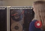 Image of Woman operates computer controls New Mexico United States USA, 1975, second 47 stock footage video 65675043085