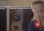 Image of Woman operates computer controls New Mexico United States USA, 1975, second 49 stock footage video 65675043085