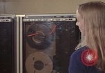 Image of Woman operates computer controls New Mexico United States USA, 1975, second 51 stock footage video 65675043085
