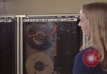 Image of Woman operates computer controls New Mexico United States USA, 1975, second 52 stock footage video 65675043085