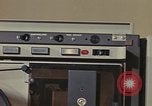 Image of Woman operates computer controls New Mexico United States USA, 1975, second 57 stock footage video 65675043085