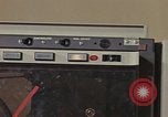 Image of Woman operates computer controls New Mexico United States USA, 1975, second 62 stock footage video 65675043085