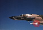 Standbild F-4E Phantom II Vietnam, 1970, aus Sekunde 44 historischem Filmmaterial Videoclip 65675043100