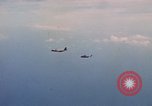 Standbild HH-3E in Flug Vietnam, 1970, aus Sekunde 17 historischem Filmmaterial Videoclip 65675043125