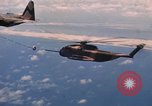Standbild HH-3E in Flug Vietnam, 1970, aus Sekunde 59 historischem Filmmaterial Videoclip 65675043125