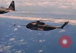 Standbild HH-3E in Flug Vietnam, 1970, aus Sekunde 60 historischem Filmmaterial Videoclip 65675043125