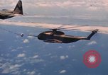 Standbild HH-3E in Flug Vietnam, 1970, aus Sekunde 61 historischem Filmmaterial Videoclip 65675043125
