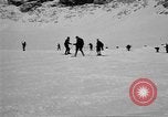 Image of Ski patrolmen Garmisch-Partenkirchen Germany, 1965, second 36 stock footage video 65675043200