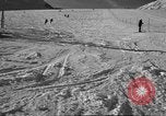 Image of ski patrolmen rescue skier Garmisch-Partenkirchen Germany, 1965, second 16 stock footage video 65675043203