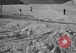Image of ski patrolmen rescue skier Garmisch-Partenkirchen Germany, 1965, second 18 stock footage video 65675043203
