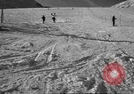 Image of ski patrolmen rescue skier Garmisch-Partenkirchen Germany, 1965, second 19 stock footage video 65675043203