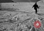 Image of ski patrolmen rescue skier Garmisch-Partenkirchen Germany, 1965, second 23 stock footage video 65675043203