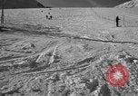 Image of ski patrolmen rescue skier Garmisch-Partenkirchen Germany, 1965, second 26 stock footage video 65675043203