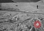 Image of ski patrolmen rescue skier Garmisch-Partenkirchen Germany, 1965, second 27 stock footage video 65675043203