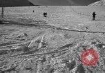 Image of ski patrolmen rescue skier Garmisch-Partenkirchen Germany, 1965, second 32 stock footage video 65675043203